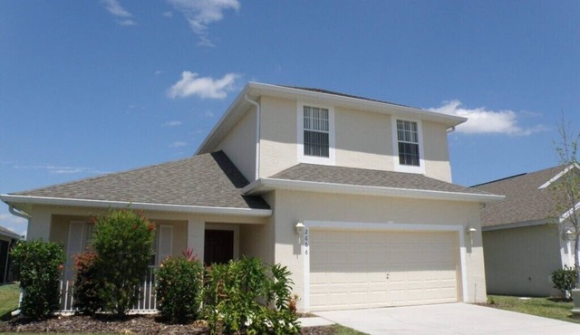 4 bedroom 2 storey pool home with stunning lake views on gated community