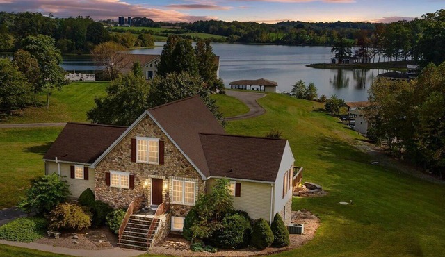 4-bedroom 3-bath Lakefront home with private dock. Can sleep up to 14 people.