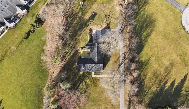 4 bedroom 3 bathroom house with spacious deck and 1 acre