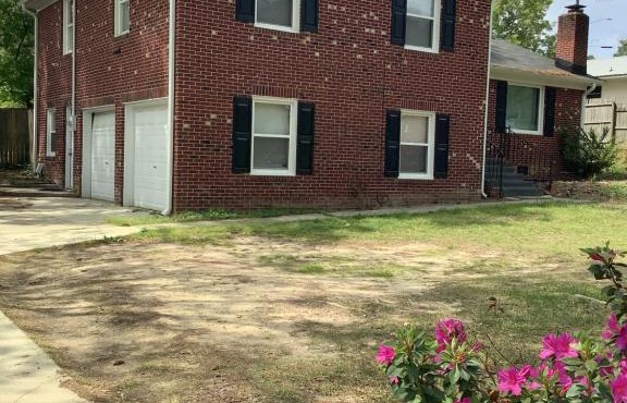 4-bedroom brick home with a full kitchen, king size bed and all the space you need for you and your large family on your getaway.