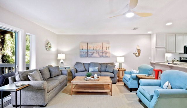 4 bedroom condo. Community pool. Close to pier/village area and beach.