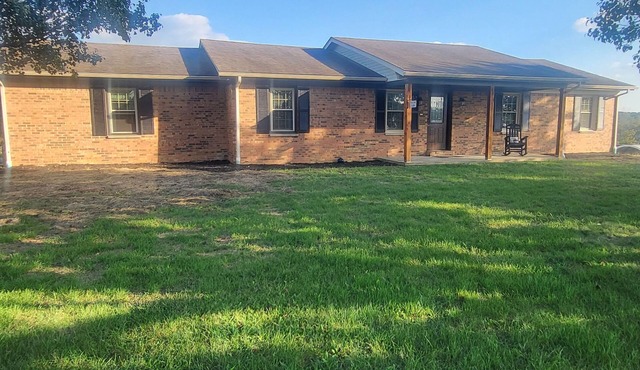 4-bedroom farm house in charming Lawrenceburg with a pool and hot tub.