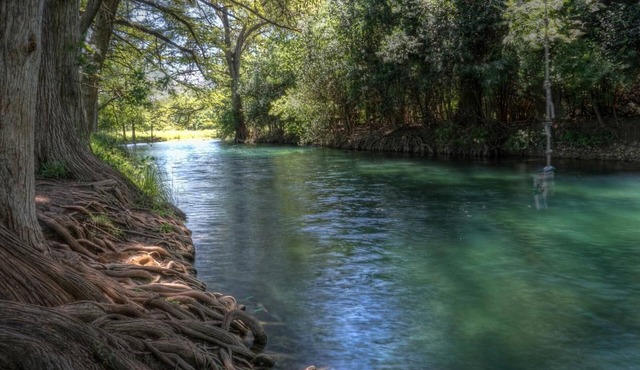 4-bedroom house in Utopia with 450’ of private crystal clear Sabinal river front