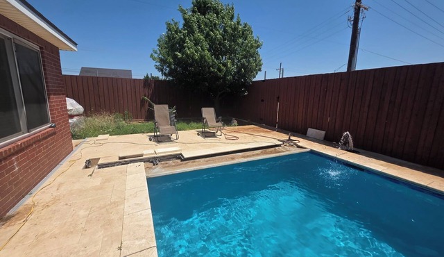 4-bedroom house in wonderful Lubbock with AC, WiFi, and swimming pool