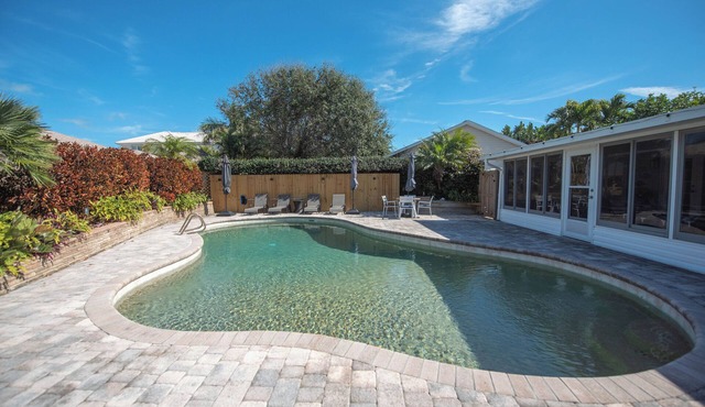 4-bedroom house in Melbourne Beach w/heated pool and only steps to the beach
