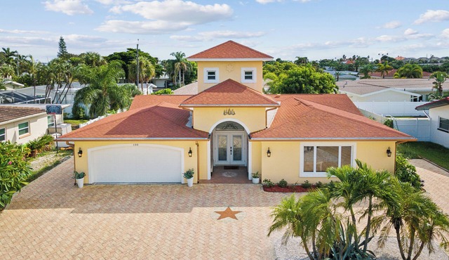4-bedroom POOL HOME steps to semi-private white sand & sunsets in Belleair Beach