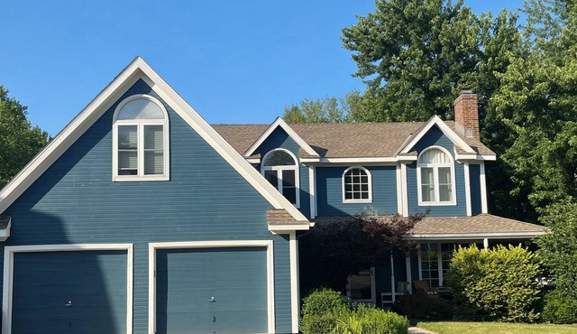 4-bedroom, sleeps 12 with walking trail and easy highway access.