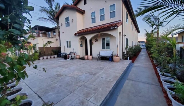 4 Bedrooms 3 Full Bath hops away from Marina & Beach.