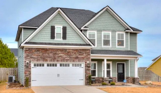 4 bedrooms 3 FULL baths- Large Outdoor Living Space- 20 minutes to the Masters!