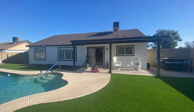 4 BR, 2 BA home with heated pool located near shopping, dining & entertainment