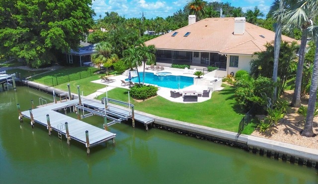 4 BR/3 BA Lido Canal Home by FVC