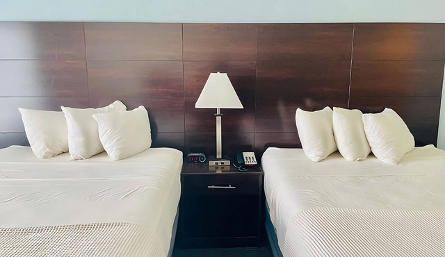 4 Double Queen With Kitchenette at FairBridge Inn & Suites Cuero!