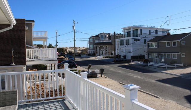 4 Houses to THE BEACH! Completely renovated Duplex- 1st Floor- WALK TO ALL!