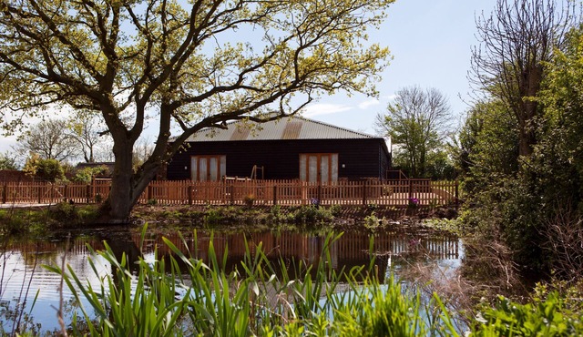 4 luxury barns in one, for up to 12, plus large games/dining room.