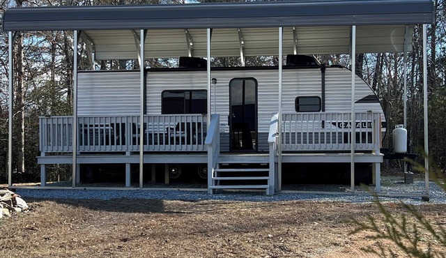 4 miles from lake James State Park. Enjoy this brand new camper on private lot.
