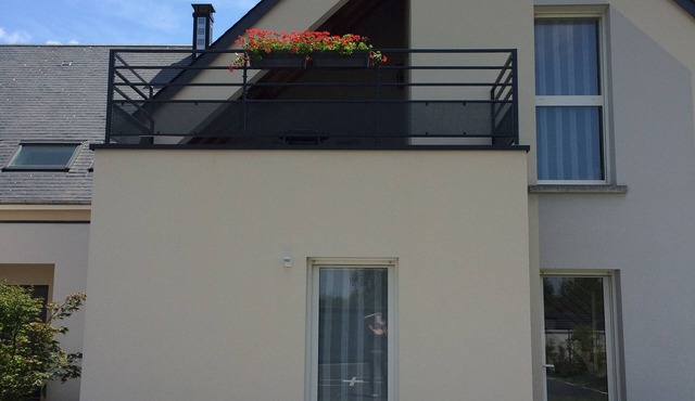 4-person gite in semi-detached house with small garden and enclosed parking lot