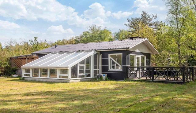 4 person holiday home in Fårvang