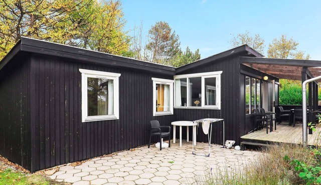 4 person holiday home in Martofte