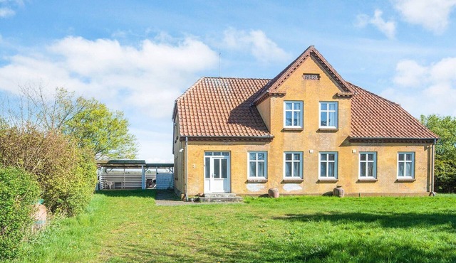 4 person holiday home in Grenaa