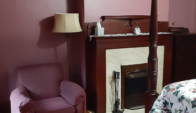 4 poster Queen Bed upstairs in Historic Victorian Inn