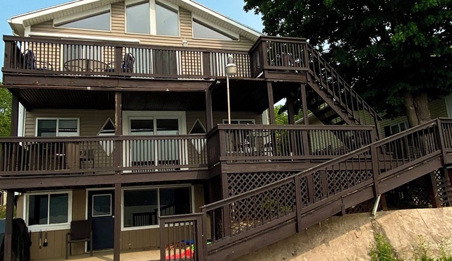 4 season escape boasts 5 beds and now a HOT TUB to enjoy any time of year!