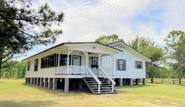 40 Acres 4 Bedroom 4 full bathroom Home with a Pond stocked with Fish & RV Port