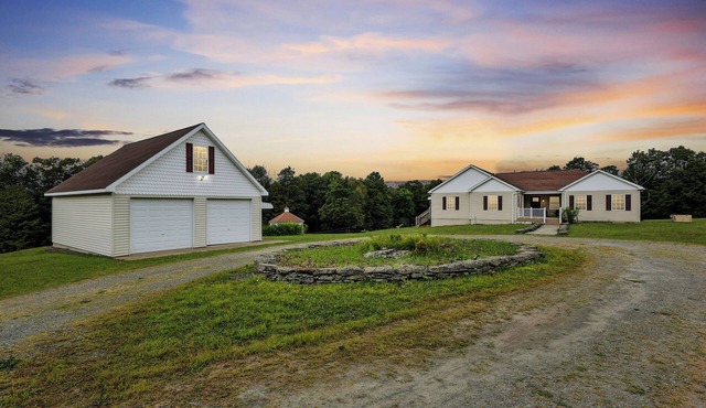 40 acres, sleeps 20, minutes from Elk, fishing streams, rails to trails .