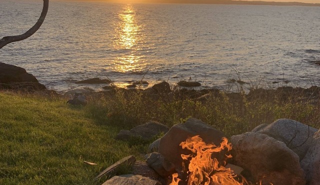 45 feet in the cliffs of maine watching sunsets with a fire! And the whales!!!