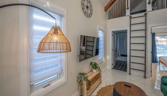 48H-3 · Kingsdale Designer Tiny House with Tesla Charger
