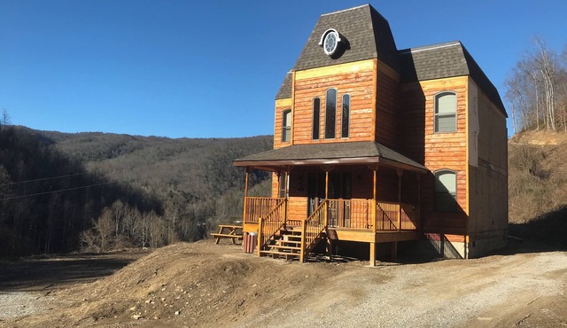 4BR 2 bath house with full kitchen, living room, hot tub and game room.