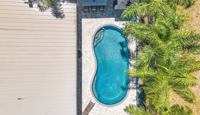 4BR Heated Pool, Putting Green & Outdoor Bar Near Mayo Clinic Jacksonville SMV