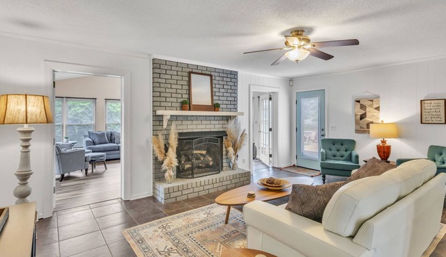 4BR Stay: Pet-Friendly, Sunroom, Fence & Fire Pit