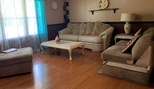 5 bdrm, 3 full bth, large living room and fireplace area.