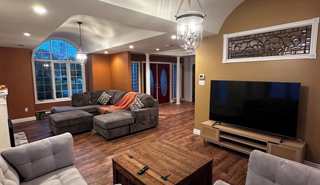 5-bedroom oasis in central St. John's, featuring a deck overlooking lush greens.