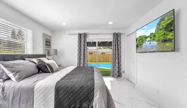 5-Bedroom Oasis w/Private Pool + Putting Green in vibrant Hollywood Florida!