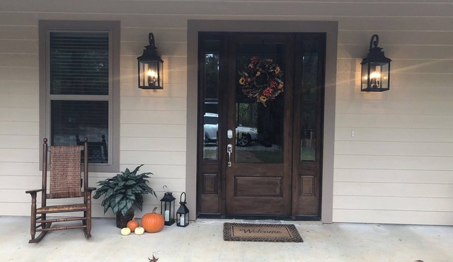 5-Bedroom Open Concept Home nestled among the Pine Trees on a quiet road.