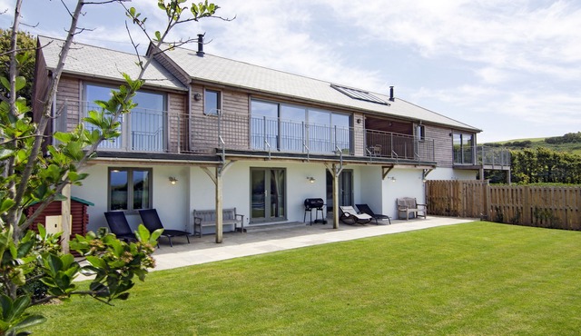 5* dog-friendly holiday home with exceptional coast and countryside views.