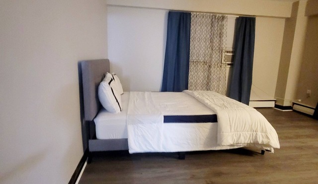 5 min from most food areas family apt. with balcony- with city view - sleeps 4+