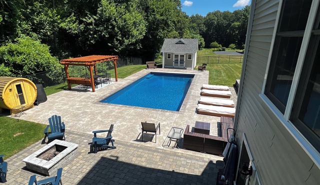 5 Minutes from World Cup Venue! Luxury Backyard Pool, Sauna & Gym in Walpole!