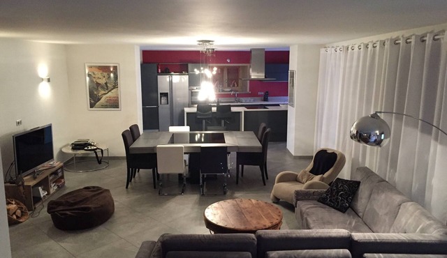 5 minutes to Grand Massif Express. Next to ski bus stop. Large living space.