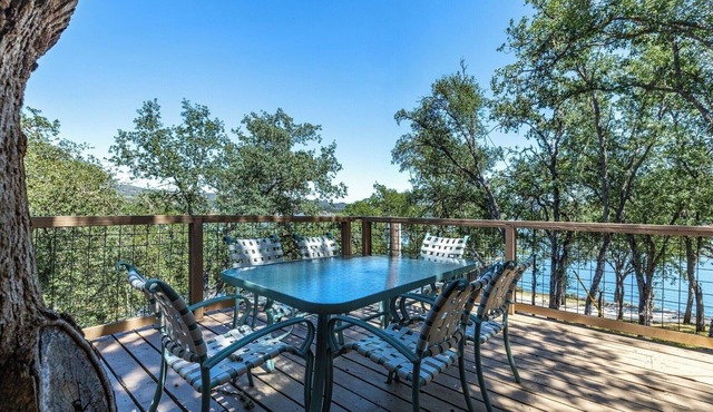 5. Tree House with Game Room (on private peninsula with dock)