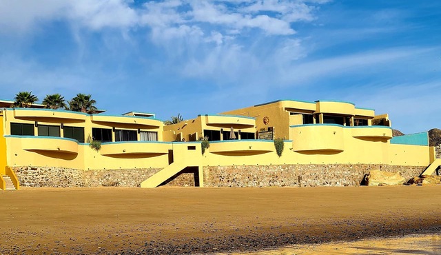 50 Steps to Sandy Beach! Relax at this Seaside Getaway close to downtown.