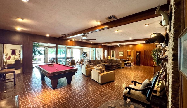 55 Acre Ranch Home with a 20 acre stocked pond!