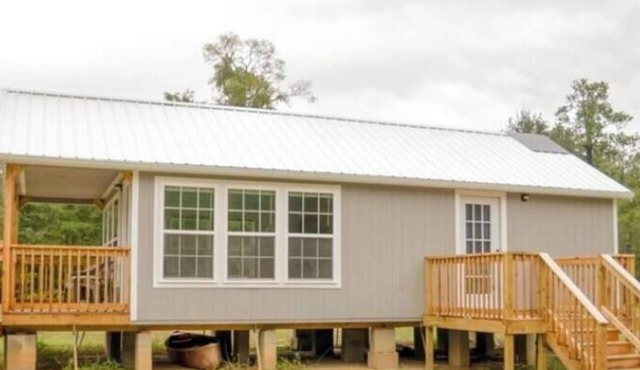 59 acres with off grid cabin, boat ramp and dock on the Edisto River Ridgeville