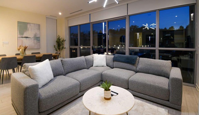 5BR townhouse with private dock, patios, and stunning views.
