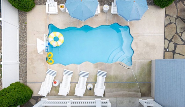 6 Bed 5 Bath Beach Home with Elevator, Pool & Decks Steps from the Beach