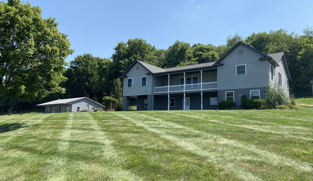 6-bedroom Amish homestead with woods & pond offering fishing/boating