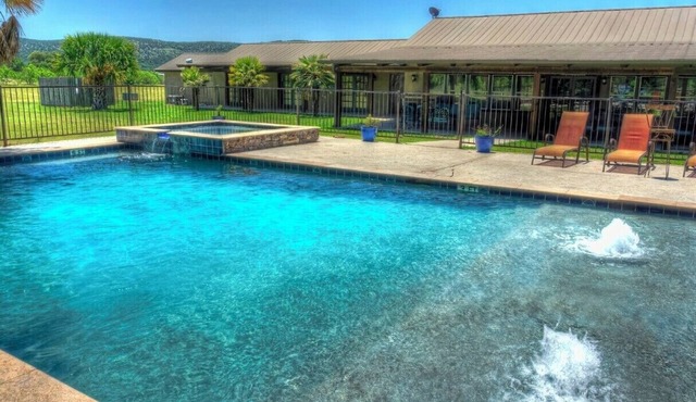 6-bedroom Lodge on 12 acres in Concan, Texas. Swimming pool & hot tub.