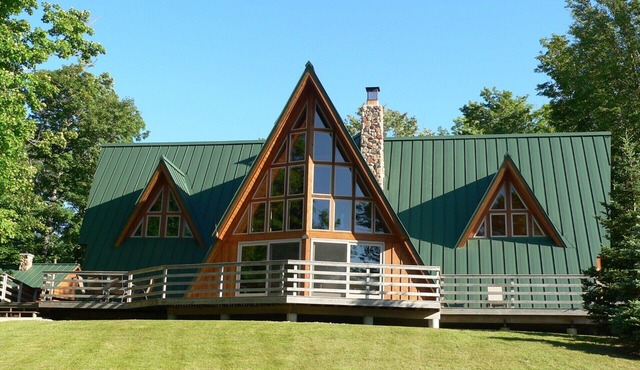 6-bedroom lodge with private lake and 200 pristine acres of forest.