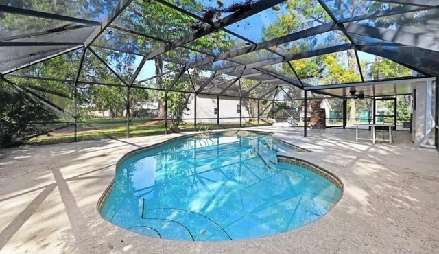 6 bedrooms. 3 with King size Beds! .Large Pool, huge fenced yard for your pets!